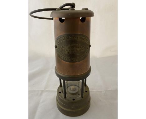 A vintage British Coal Mining Company miners lamp 