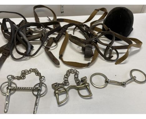 A job lot of assorted vintage equestrian tack 