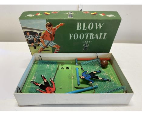 A vintage Marchant games blow football set 