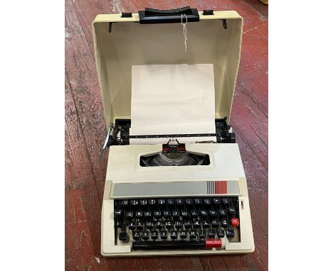 A vintage portable typewriter, shipping unavailable 