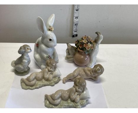 Six assorted Lladro and Nao figurines 