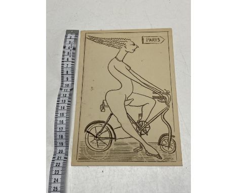 A Dominic Fels lady on a bike surrealist ink sketch, signed 