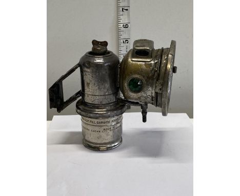 A vintage Joseph Lucas 'Calcia Cadet' cycle lamp 