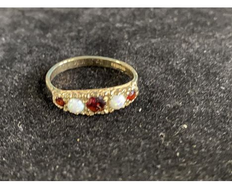 A 9ct gold red garnet and opal ring size Q 3.04g 