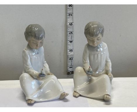 Two Nao figurines 