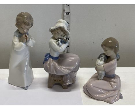 Three Nao figurines 