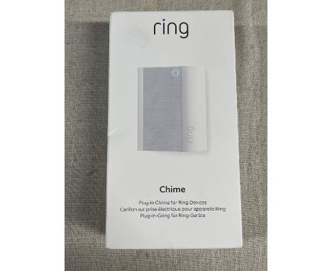 A boxed and sealed Ring plug in door chime (untested) 