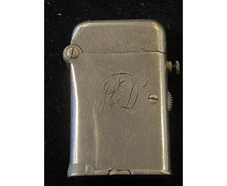 A vintage Thorens Teleflam lighter with monogram to front 