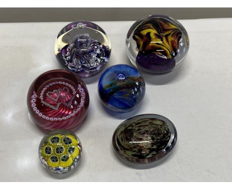 A selection of assorted paperweights including Caithness and other signed paperweights 