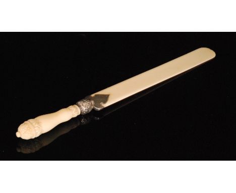 A Victorian carved ivory handled page turner with silver mounts and engraved decoration, monogrammed and hallmarked Birmingha