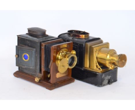 A 19th Century brass magic lantern Pamphengos by W C Hughes with original wooden carrying case, instructions to door together