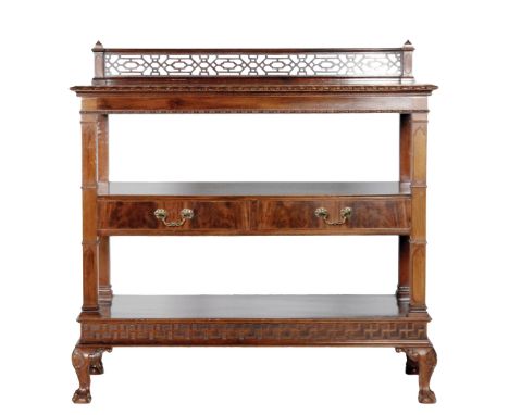 A Chippendale style carved mahogany buffet, the blind fret ledge back over two short drawers flanked by pilasters on cabriole