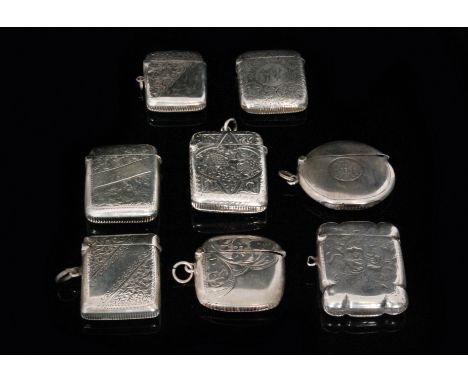 Eight Victorian and Edwardian hallmarked silver vesta cases, to include six rectangular foliate engraved examples each with h