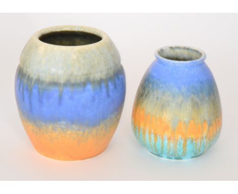 Two Ruskin Pottery vases, the first of swollen form and decorated in a pale green to blue to orange glaze, dated 1930, height