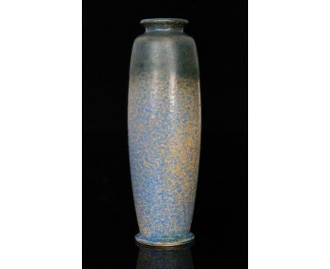 A Ruskin Pottery vase of rolling pin form decorated with a mottled blue and sand coloured glaze, impressed mark, dated 1931, 