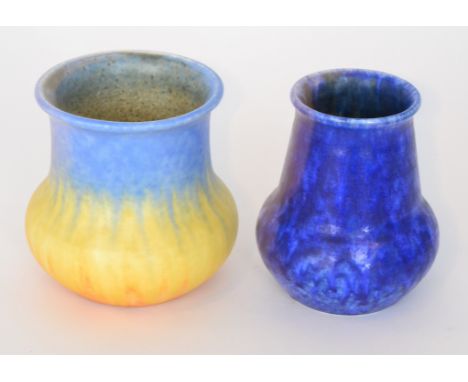 Two Ruskin Pottery vases, the first decorated in blue to yellow to orange streaked glaze, incised W. Howson Taylor, dated 193