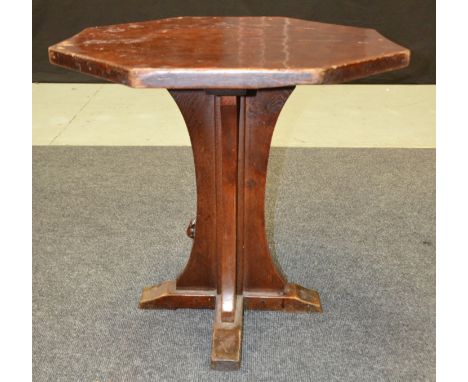 A Robert 'Mouseman' Thompson oak occasional table of octagonal form, the adzed top above a quatre-foil pedestal base with car