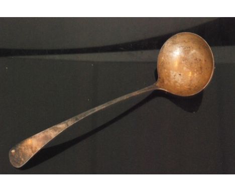 A hallmarked silver old English pattern soup ladle of plain form, engraved initial to terminal, length 30cm, Sheffield 1923.