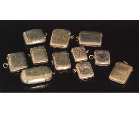 Nine Victorian and later hallmarked silver vesta cases, all of rectangular outline six with engraved foliate decoration, two 