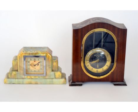A 1940s mahogany cased gravity clock together with a ceramic cased electric Smiths Art Deco mantle clock in Ruskin style glaz