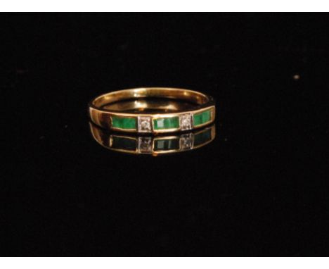 A 14ct emerald and diamond half eternity ring, three pairs of square cut channel set emeralds each spaced by a diamond, ring 