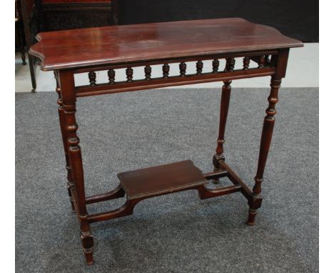 An early 20th Century mahogany side table, the top with a thumb-moulded edge and a turned spindle galleried frieze with stret