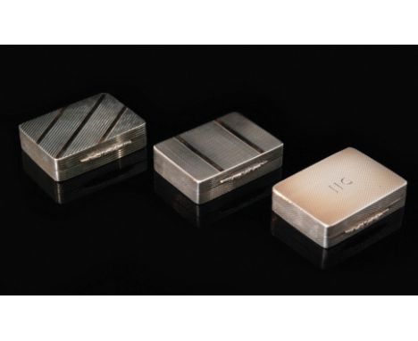 Three modern hallmarked silver rectangular snuff boxes, each of engine turned design with rose gold striped highlight, foliat