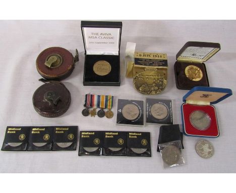 Assorted commemorative coins etc, WWI miniature medals, vintage tape measures etc