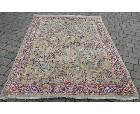 Green ground Middle Eastern carpet 240cm by 168cm