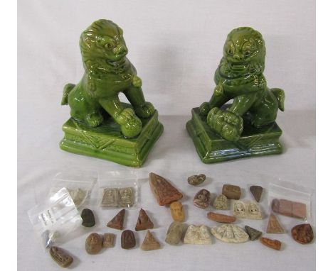 Pair of ceramic Foo dogs and assorted Buddha stones etc