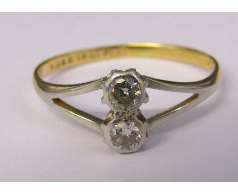 18ct gold and platinum two stone diamond ring approximately 0.20 ct size M weight 1.6 g