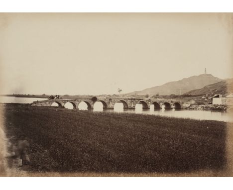 * Attributed to John Thomson (1837-1921). Nine Arch Bridge outside Soochow [Suzhou, China], c. 1869, albumen print, 24.0 x 33