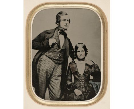 * Ambrotype. A half-plate ambrotype of David Wilkinson and his wife, c. 1870, the man three-quarter length standing beside hi