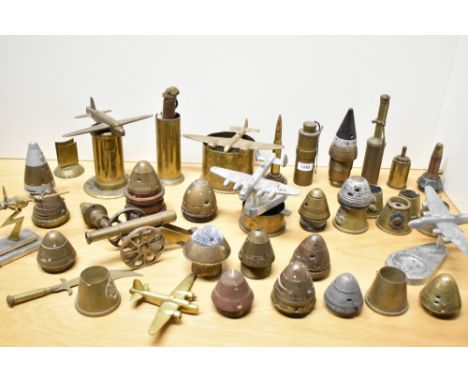 A collection of mixed World War I &amp; II brass Trench art and associated remnants, to include adapted shell case ashtray, t