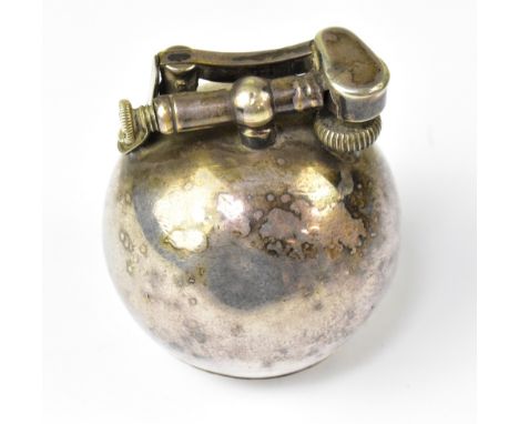 DUNHILL; a silver plated 'Unique' lighter of circular bowl shape, with an unscrewable bottom section, marked to base 'Unique 