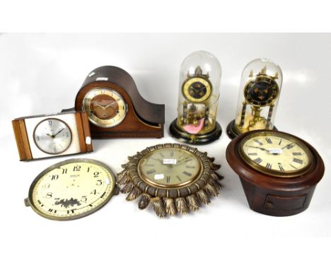 A group of various 20th century clocks to include a mahogany cased eight day chiming Napoleon hat mantel clock, the gilded an