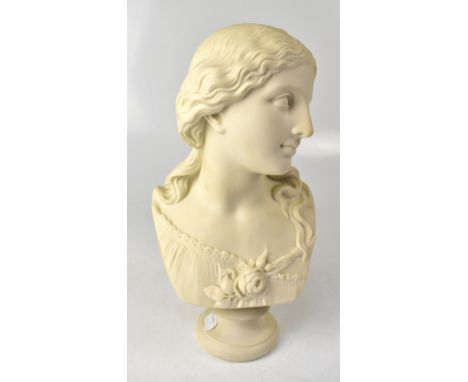 R MONTI; a Copeland Crystal Palace Art Union Parian ware bust of a young woman in Classical garb, with rose at breast, signed