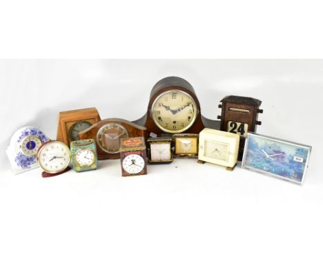 A group of early/mid-20th century mantel and alarm clocks to include an oak cased eight day Napoleon hat clock, a Westclox ma