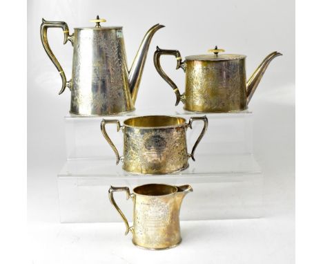 A Victorian hallmarked silver four-piece tea service of oval form comprising teapot, height 14cm, hot water jug, twin-handled