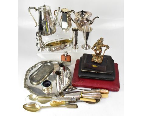 A quantity of silver plated items including a salver raised on ball and claw feet, teapot, coffee pot and loose cutlery, napk