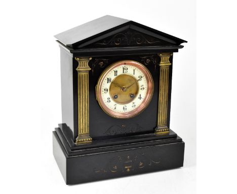 A Victorian black slate eight day mantel clock, the ivorine chapter ring set with Arabic numerals, movement striking on coil,