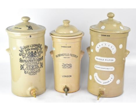 Three Victorian salt glazed water filters, comprising a 'Doulton's New Patent Manganous Carbon Filter, Lambeth, London' examp