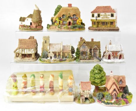 A vintage ceramic toast rack in the form of the Seven Dwarves and a quantity of Liliput Lane buildings to include 'Kentish Oa