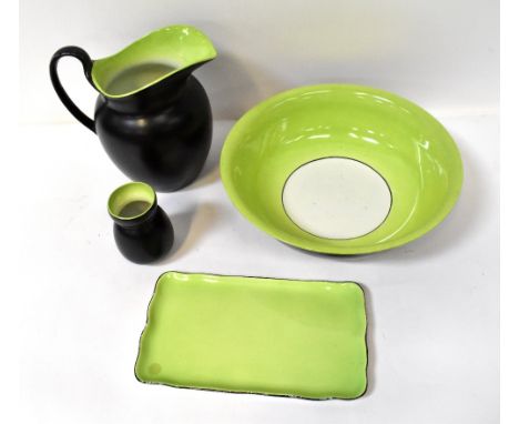 An Art Deco 1920s/30s matching set of wash bowl, wash jug, tray and vase, decorated with a light green and white interior gla