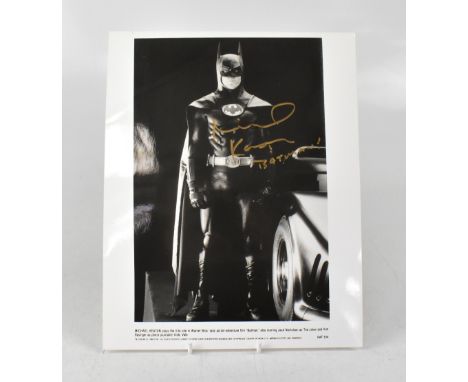 BATMAN; a black and white photograph bearing the signature of Michael Keaton, 25.5 x 20cm.We have not authenticated this sign