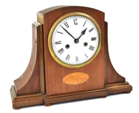 An early 20th century inlaid mahogany eight day mantel clock, the enamelled dial set with Roman numerals, striking on coil, m