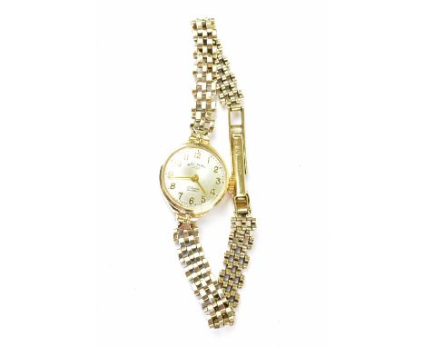 ROTARY; a ladies' 9ct gold wristwatch, the silvered dial set with Arabic numerals and gold hands, crown wind movement, in a 9
