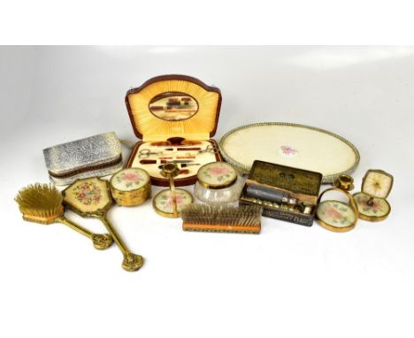 A quantity of early/mid-20th century boxed sets of travelling vanity cases and manicure items to include bone examples, trave