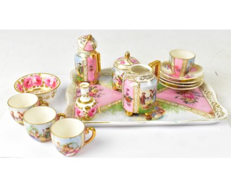 A 19th century Dresden-style children's porcelain dolls' tea set, comprising a coffee jug, water jug, four cups, four saucers