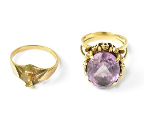 A 9ct yellow gold ladies' dress ring set with oval faceted cut amethyst stone, size L and a 9ct gold ring, lacking central st